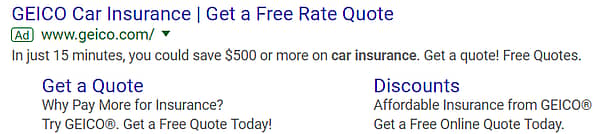 Example of a paid text ad from Geico Insurance for a Free Rate Quote.  The ad includes a headline and description for Geico indicating that it only takes 15 mins to get the quote and indicating that a quote is free.